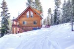 Arrow Lodge - Winter view of log cabin. 